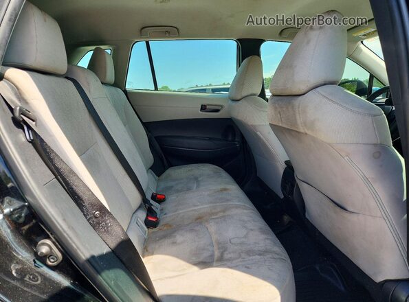 7MUAAAAG1PV049496 2023 TOYOTA COROLLA Black Vista interior trasera