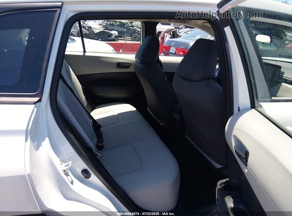 7MUAAAAG2RV106887 2024 TOYOTA COROLLA CROSS White Vista de la etiqueta del VIN