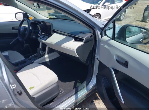 7MUAAABG7PV057732 2023 TOYOTA COROLLA CROSS Silver Vista interior delantera