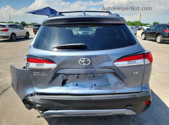 7MUBAAAG6RV084252 2024 TOYOTA COROLLA Gray Rear view