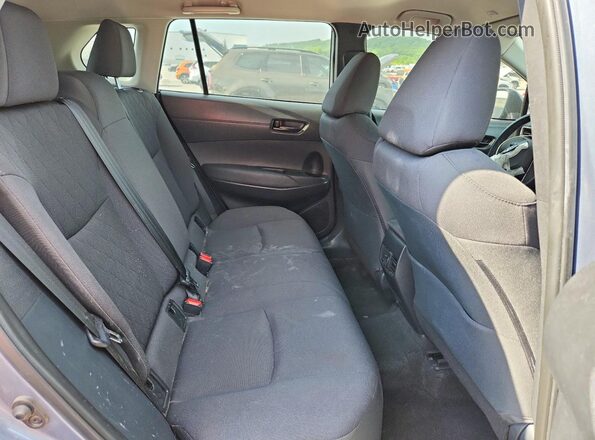 7MUCAAAG3PV041179 2023 TOYOTA COROLLA Silver Vista interior trasera