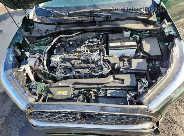 7MUDAAAG0PV068439 2023 TOYOTA COROLLA Green Vista del compartimento del motor