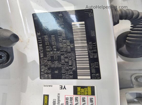 7MUDAAAG4PV058951 2023 TOYOTA COROLLA White Widok naklejki z numerem VIN