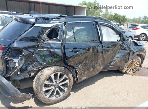 7MUDAAAG6PV070440 2023 TOYOTA COROLLA CROSS Black Front view