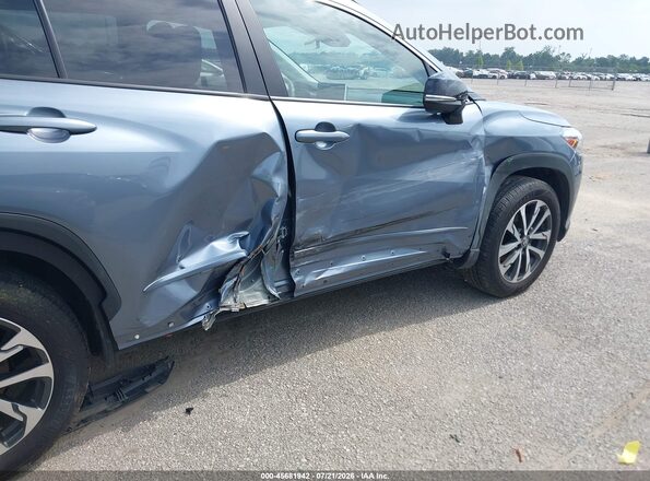 7MUDAAAG6SV136445 2025 TOYOTA COROLLA CROSS Blue Vista frontal