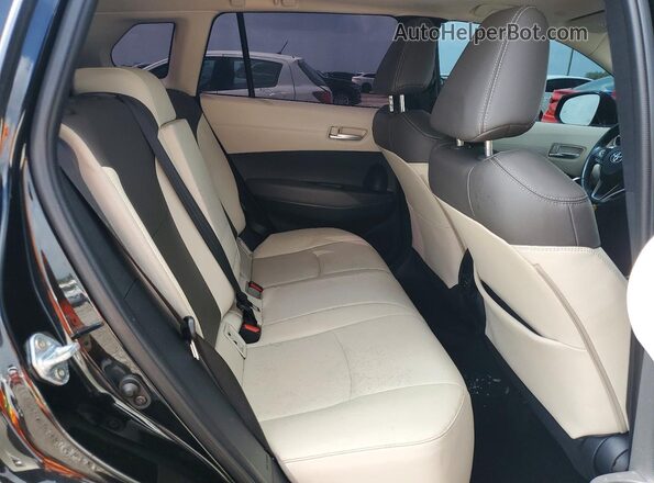 7MUDAAAG9PV055088 2023 TOYOTA COROLLA Black Rear seats view