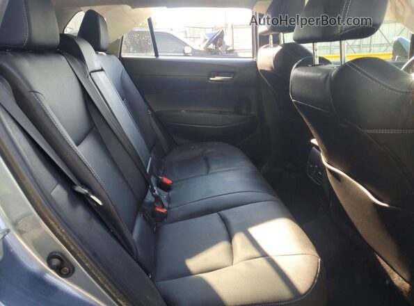 7MUDAAAGXNV034361 2022 TOYOTA COROLLA Gray Вид задньої частини салону