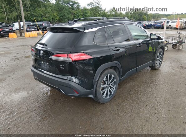 7MUDAABG0NV040667 2022 TOYOTA COROLLA CROSS Black Tył prawy