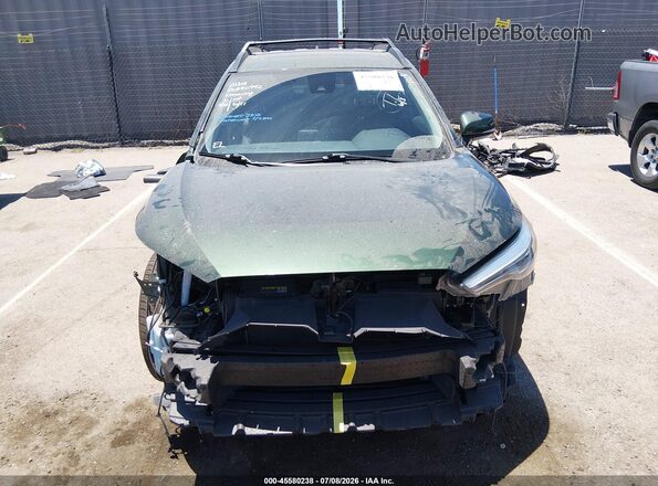 7MUDAABG5NV032371 2022 TOYOTA COROLLA CROSS Green Սալոնի հետևի տեսք