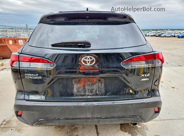 7MUDAABG8RV102404 2024 TOYOTA COROLLA Black Rear view