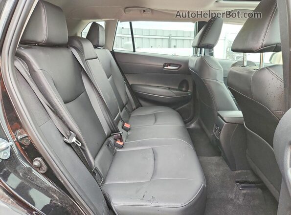 7MUDAABG8RV102404 2024 TOYOTA COROLLA Black Rear seats view