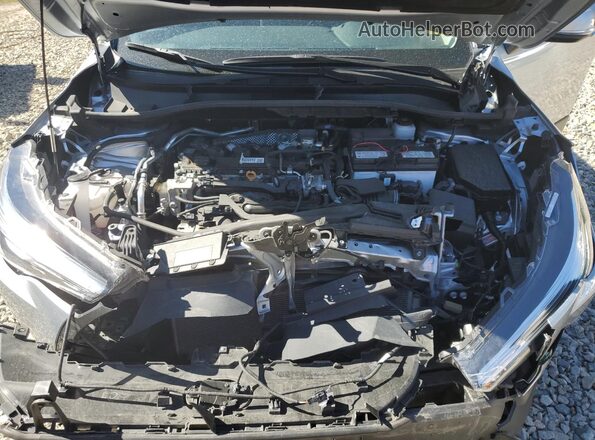 7MUEAABG2PV068638 2023 TOYOTA COROLLA Silver ძრავის განყოფილების ხედი