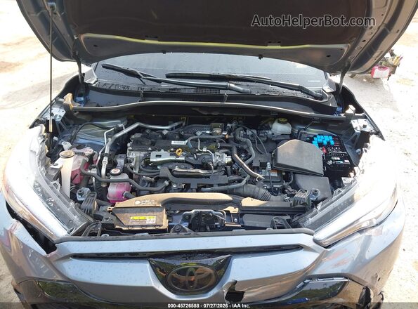 7MUFBABG0RV048974 2024 TOYOTA COROLLA CROSS HYBRID Gray Vista trasera