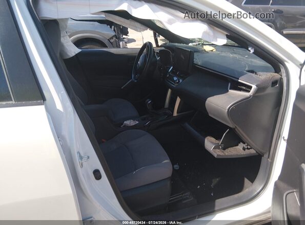 7MUFBABG2PV008148 2023 TOYOTA COROLLA CROSS HYBRID Белый Вид салона спереди