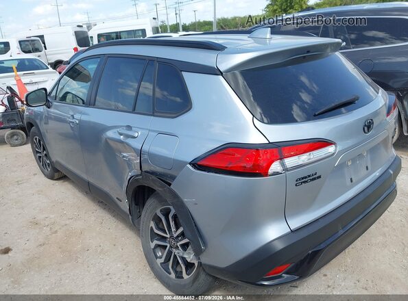 7MUFBABG5PV014719 2023 TOYOTA COROLLA CROSS HYBRID Silver Tył lewy