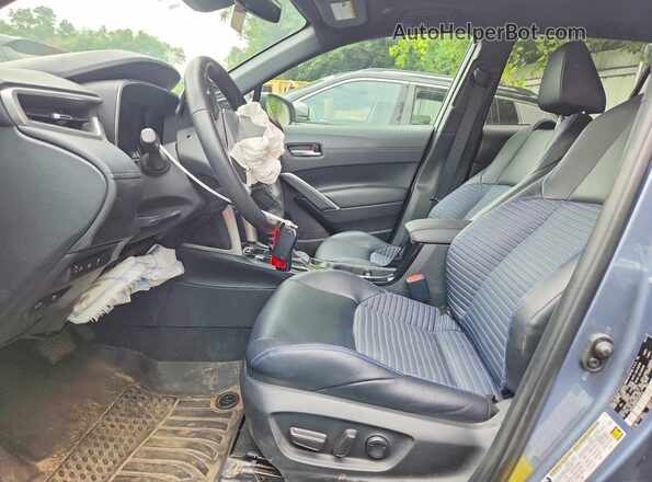 7MUFBABG9PV002525 2023 TOYOTA COROLLA Silver Front interior view