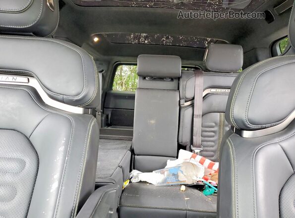 7PDSGABA8PN022088 2023 RIVIAN R1S Green Rear seats view
