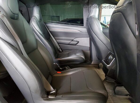 7SAXCBE50PF419521 2023 TESLA MODEL Red უკანა სალონის ხედი