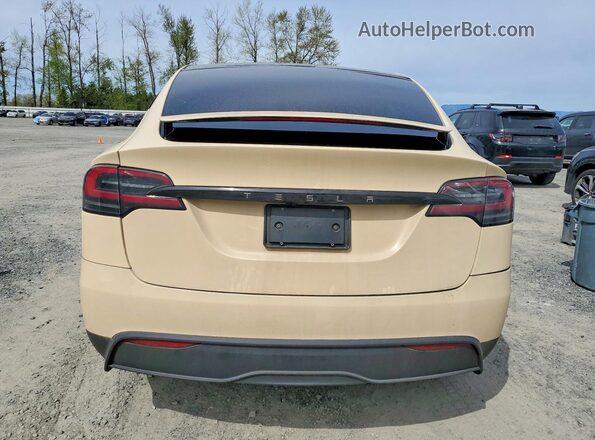 7SAXCBE51PF403490 2023 TESLA MODEL Cream Vista trasera