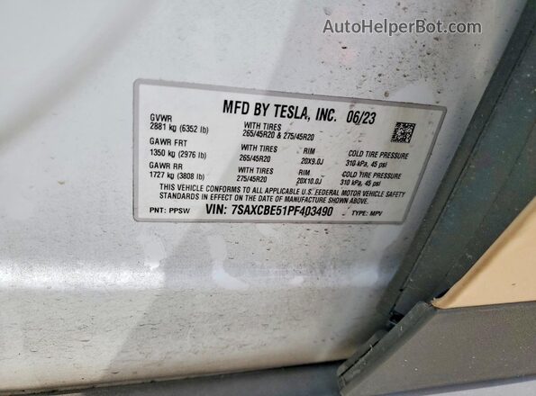 7SAXCBE51PF403490 2023 TESLA MODEL Cream Vista de la etiqueta del VIN