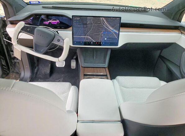 7SAXCBE52PF423179 2023 TESLA MODEL Черный Вид панели приборов