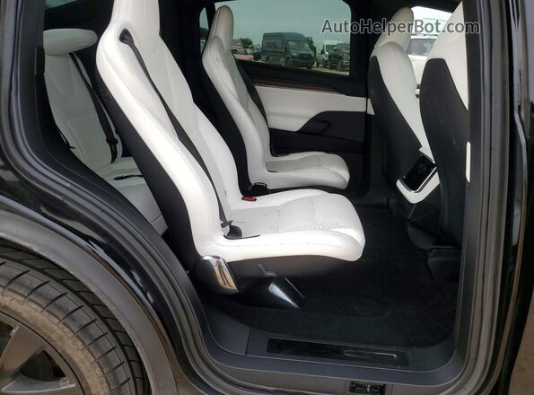 7SAXCBE52PF423179 2023 TESLA MODEL Черный Вид задних сидений