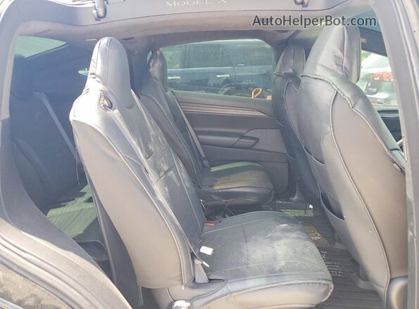 7SAXCBE5XNF359177 2022 TESLA MODEL Black Vista de los asientos traseros