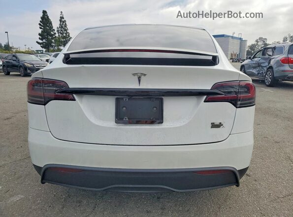 7SAXCBE68NF339387 2022 TESLA MODEL White Հետևի տեսք