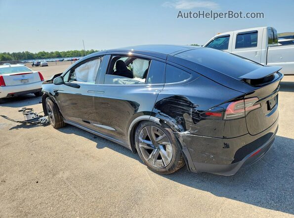 7SAXCBE68TF479811 2026 TESLA MODEL Black Trasero izquierdo