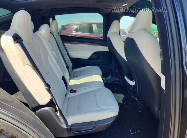 7SAXCDE51SF466125 2025 TESLA MODEL Black უკანა სავარძლების ხედი