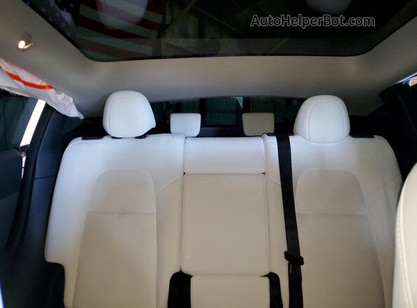 7SAYGAEE0PF682627 2023 TESLA MODEL Blue Rear seats view