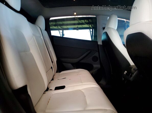 7SAYGAEE0PF682627 2023 TESLA MODEL Blue Rear interior view