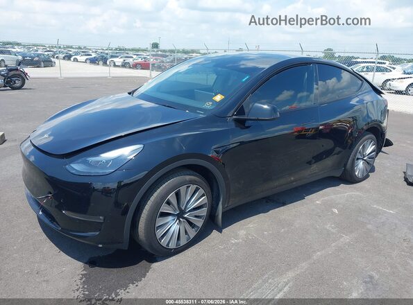 7SAYGAEE0SF269048 2025 TESLA MODEL Y Black Przód lewy