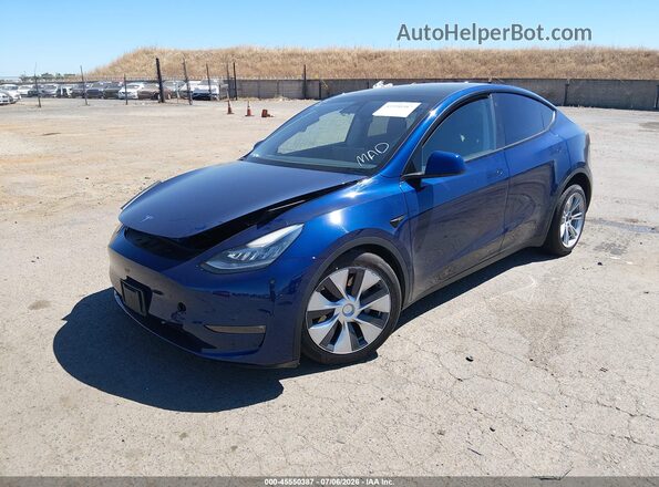 7SAYGAEE1NF382298 2022 TESLA MODEL Y Blue Vista tres cuartos delantera izquierda