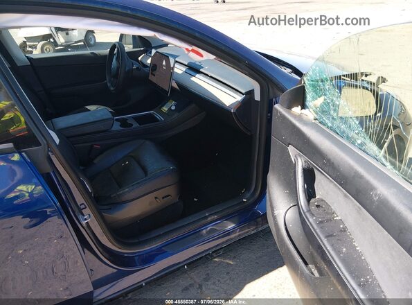 7SAYGAEE1NF382298 2022 TESLA MODEL Y Blue Vista interior delantera