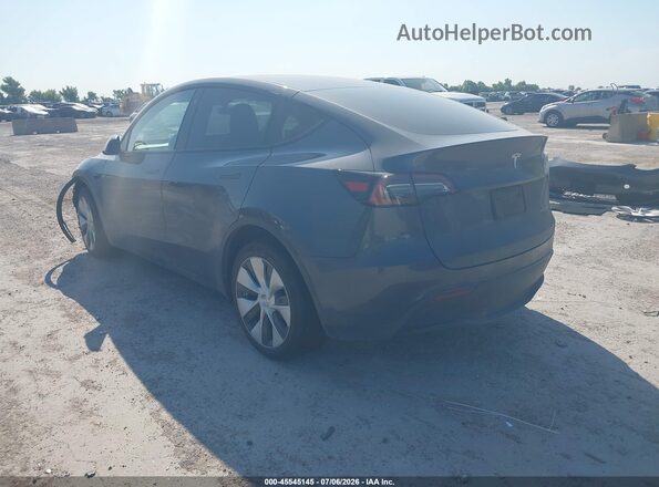 7SAYGAEE1PF610447 2023 TESLA MODEL Y Gray Trasero izquierdo