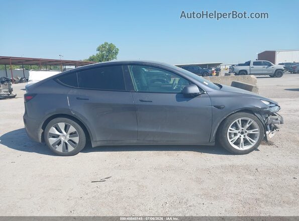 7SAYGAEE1PF610447 2023 TESLA MODEL Y Gray Vista interior trasera