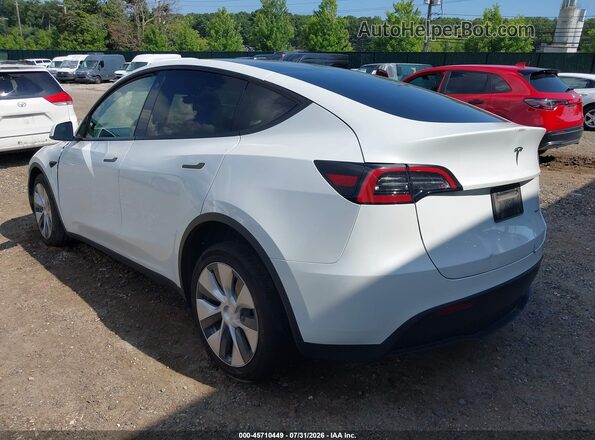 7SAYGAEE2PF591181 2023 TESLA MODEL Y White Rear left