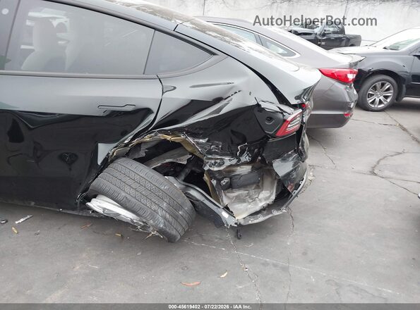 7SAYGAEE2PF646437 2023 TESLA MODEL Y Black Widok z przodu