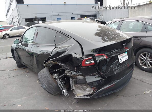 7SAYGAEE2PF646437 2023 TESLA MODEL Y Black Tył lewy