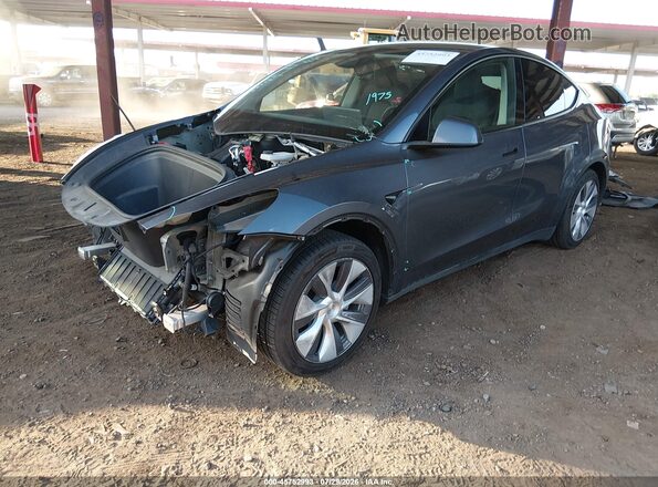 7SAYGAEE2PF915634 2023 TESLA MODEL Y Gray წინა მარცხენა ხედი სამი მეოთხედიდან