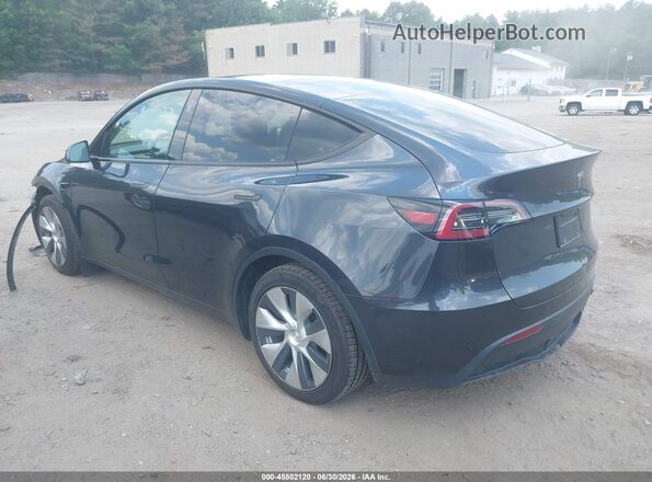 7SAYGAEE2RF002827 2024 TESLA MODEL Y Gray Trasero izquierdo