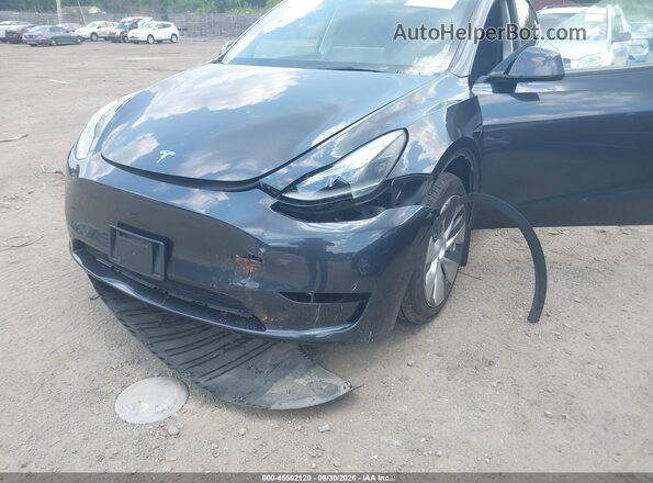 7SAYGAEE2RF002827 2024 TESLA MODEL Y Gray Vista frontal