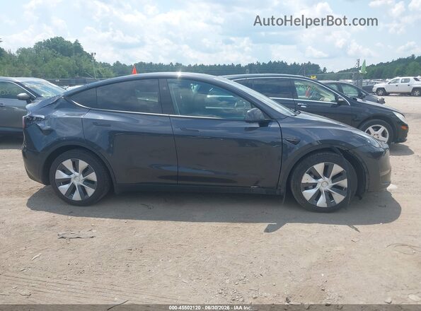 7SAYGAEE2RF002827 2024 TESLA MODEL Y Gray Vista interior trasera