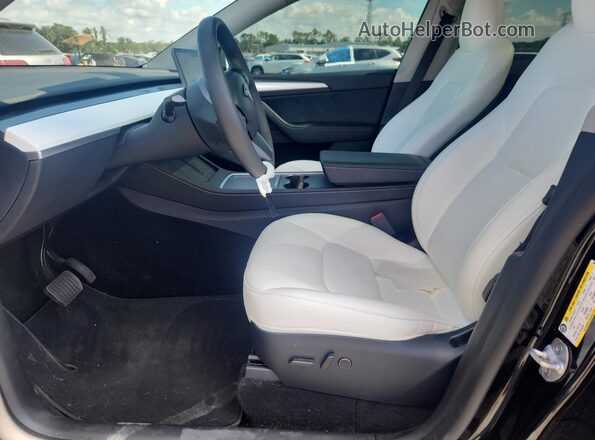 7SAYGAEE2RF064423 2024 TESLA MODEL Black წინა სალონის ხედი