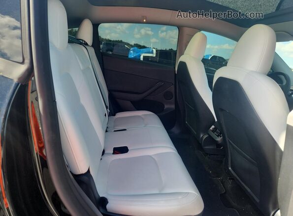 7SAYGAEE2RF064423 2024 TESLA MODEL Black უკანა სავარძლების ხედი