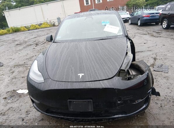 7SAYGAEE2RF151478 2024 TESLA MODEL Y Black Սարքավորումների վահանակի տեսք