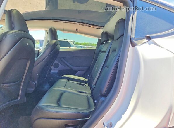 7SAYGAEE2SF306648 2025 TESLA MODEL White Սալոնի հետևի տեսք