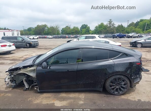7SAYGAEE3NF338786 2022 TESLA MODEL Y Black Vista interior trasera