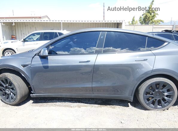 7SAYGAEE3PF902486 2023 TESLA MODEL Y Gray Widok wnętrza z tyłu